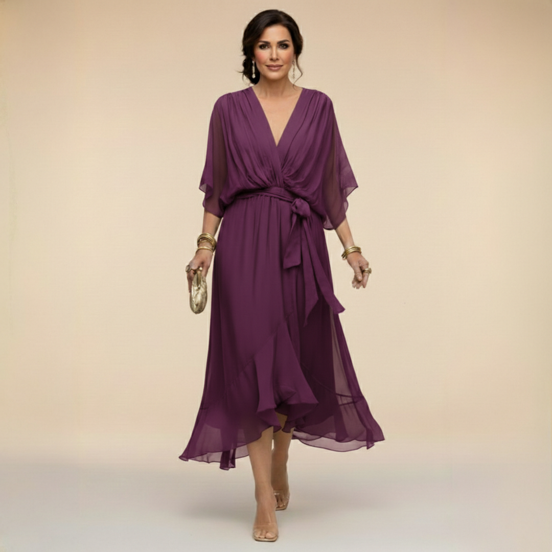 Women's elegant V-neck dress with flowy sleeves, great for special occasion fashion.