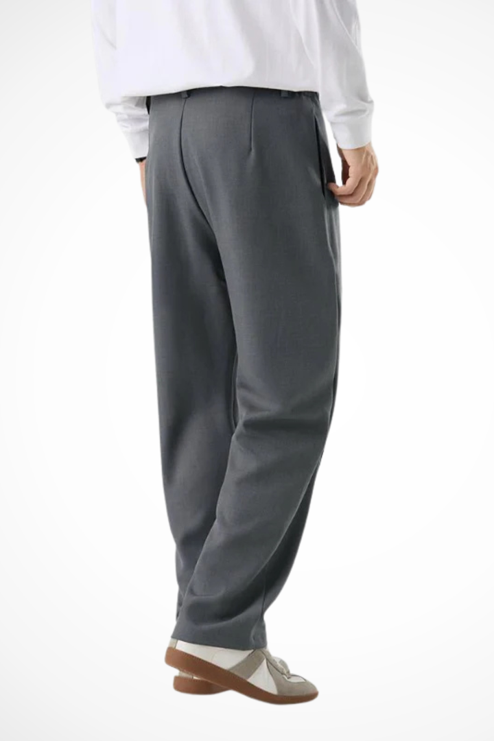 Sophisticated men's tailored trousers, wide leg design with prominent front pleats & straight hem.