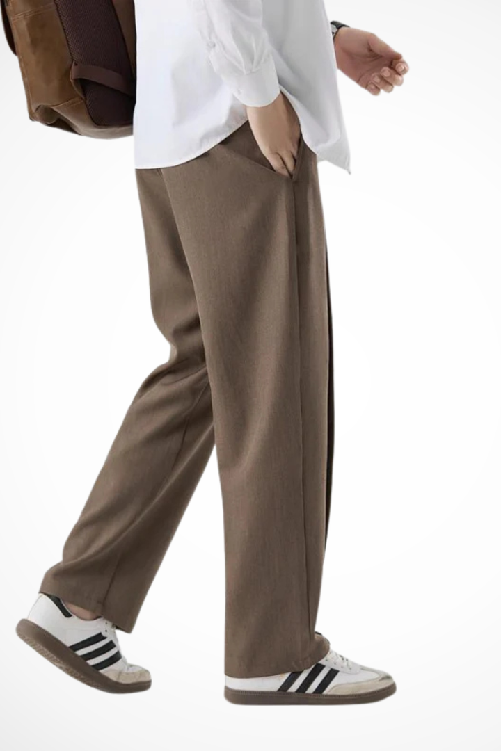 Modern men's pleated wide leg trousers, tailored for a straight hem finish. Stylish fashion.
