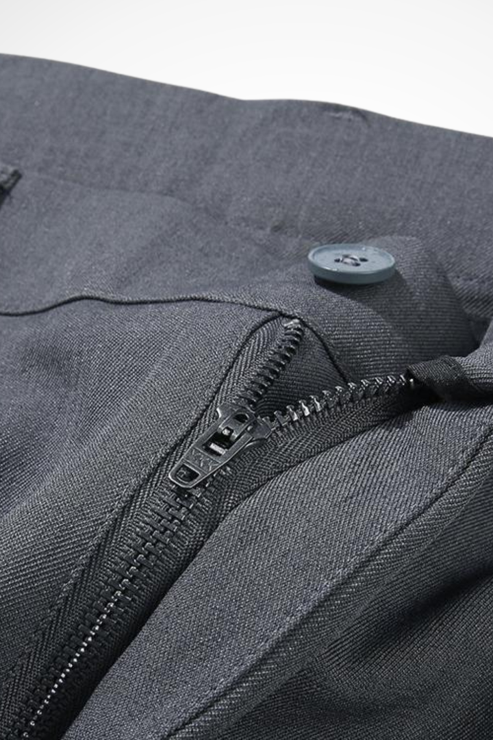 Contemporary men's pleated wide leg trousers, tailored for a clean straight hem finish. Versatile.