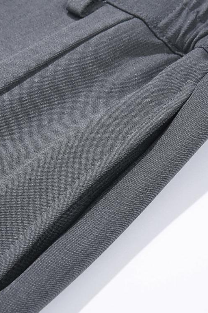 Men's smart tailored wide leg trousers, featuring classic front pleats & a refined straight hem.