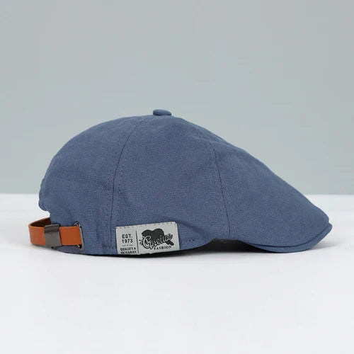 Stylish men's classic ivy cap, featuring an adjustable buckle & unique button top for versatile fashion.