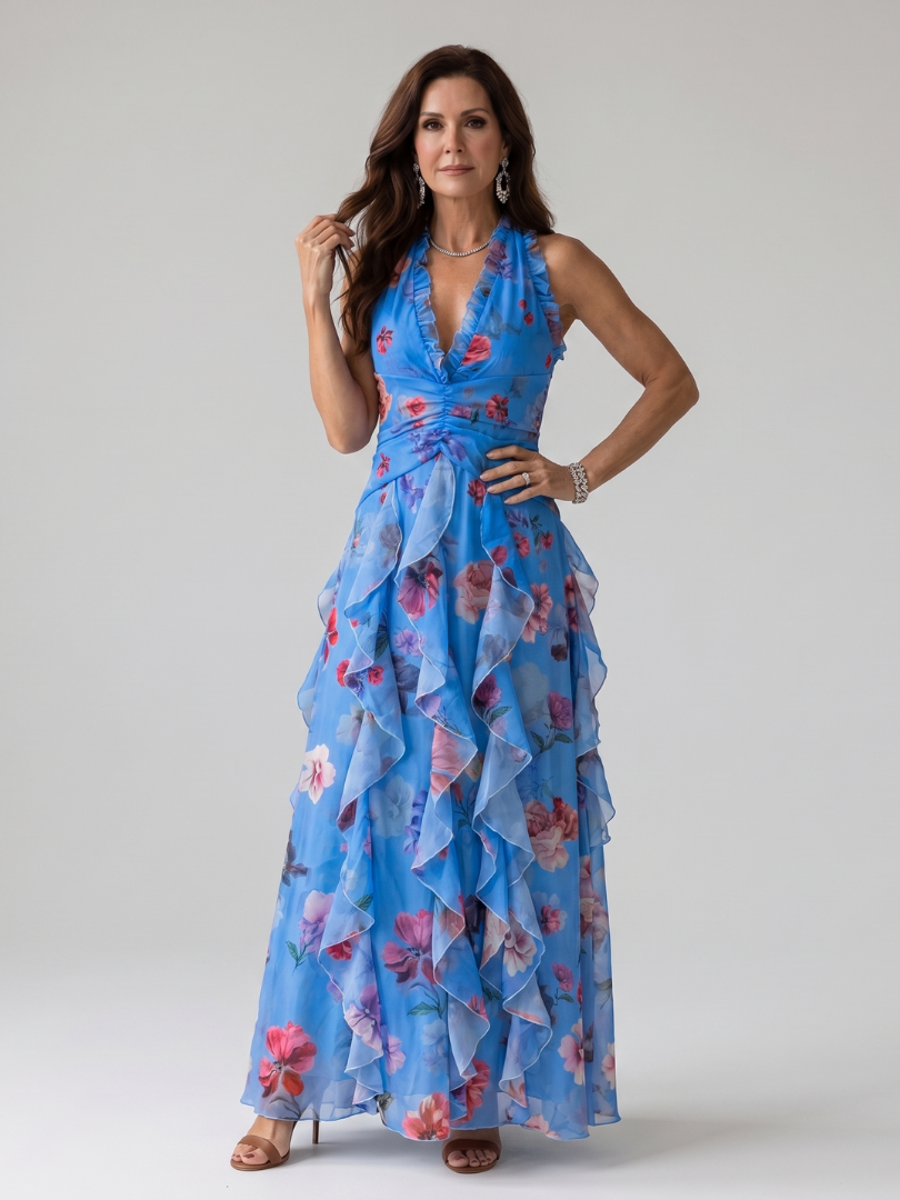 Halter neck women's floral maxi dress with ruched bodice & flowy ruffle skirt. Elegant for summer events. [[lstfy-media:6]]