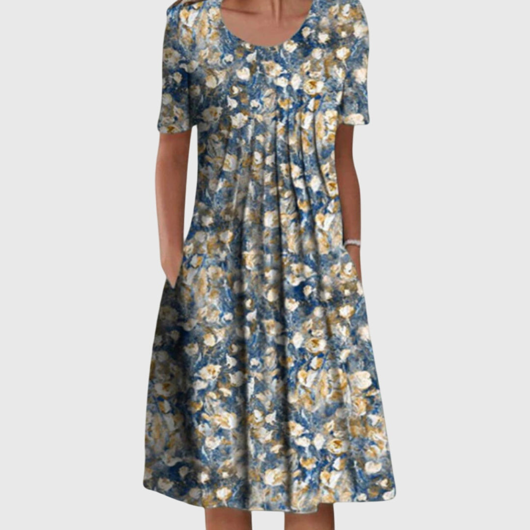 Chic women's printed floral dress, round neck design. Effortless elegance for summer parties & casual outings.