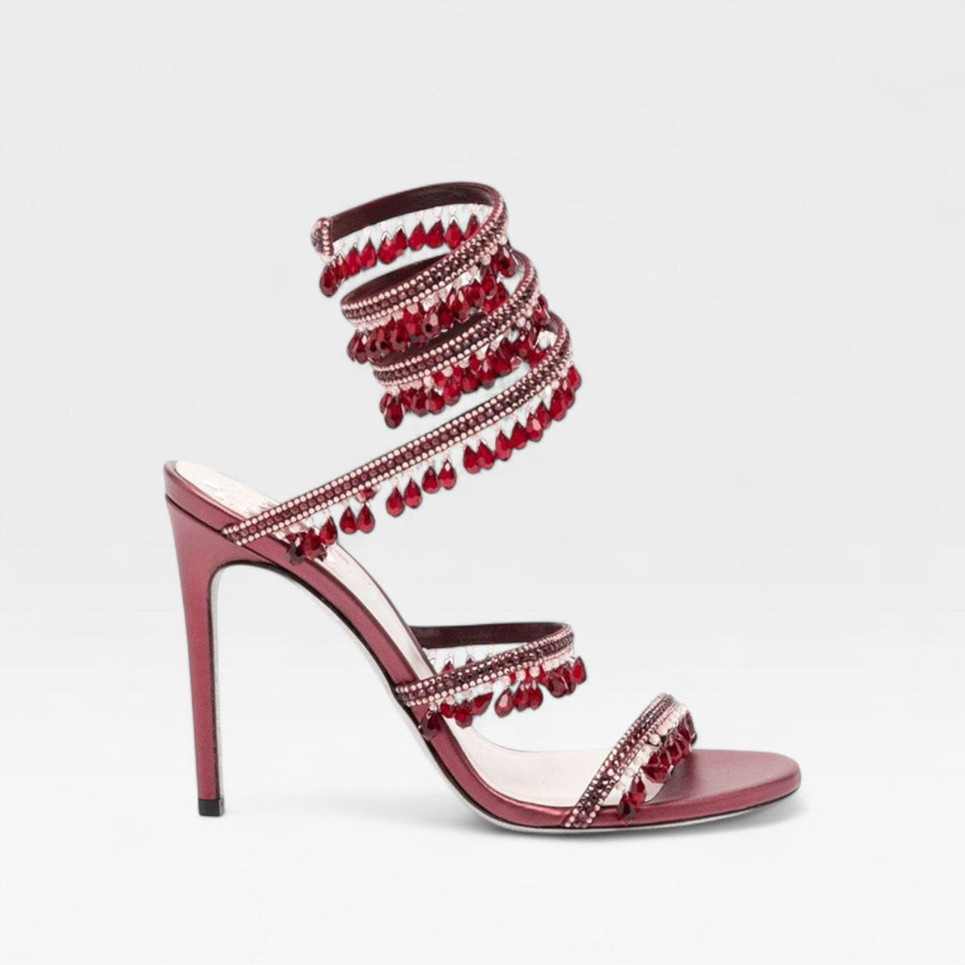 Beautiful women's sparkling strappy high heel sandals, an elegant and luxurious choice for evenings.