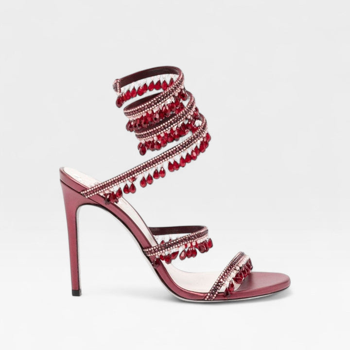 Beautiful women's sparkling strappy high heel sandals, an elegant and luxurious choice for evenings.