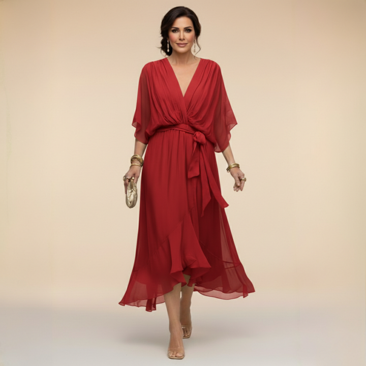Elegant women's V-neck party dress with flowing sleeves, a stylish midi for special occasions.
