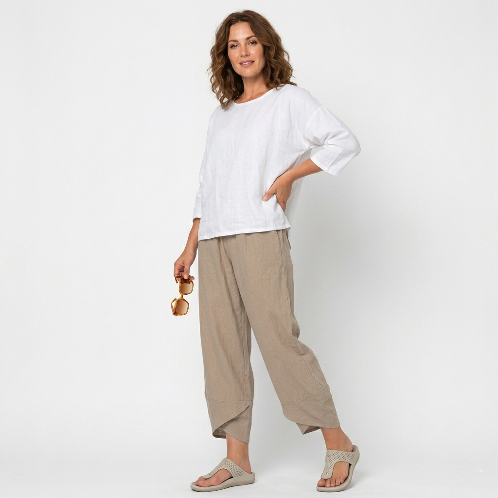 Comfortable high-waisted women's trousers with a stylish tulip hem. Breathable fabric, great for summer bottoms.