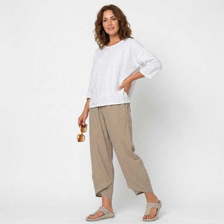 Comfortable high-waisted women's trousers with a stylish tulip hem. Breathable fabric, great for summer bottoms.