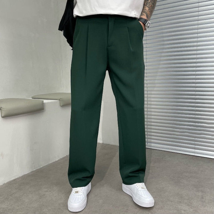 Classic men's wide-leg formal trousers with elegant double pleats, offering a comfortable & stylish fit.
