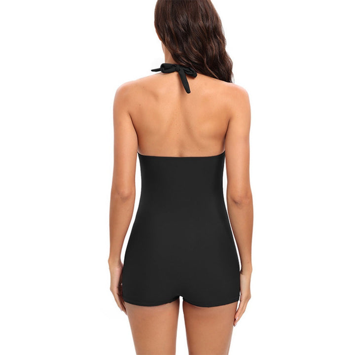 Plus size women's one-piece bathing suit with tummy control and modest leg, ideal for vacation.