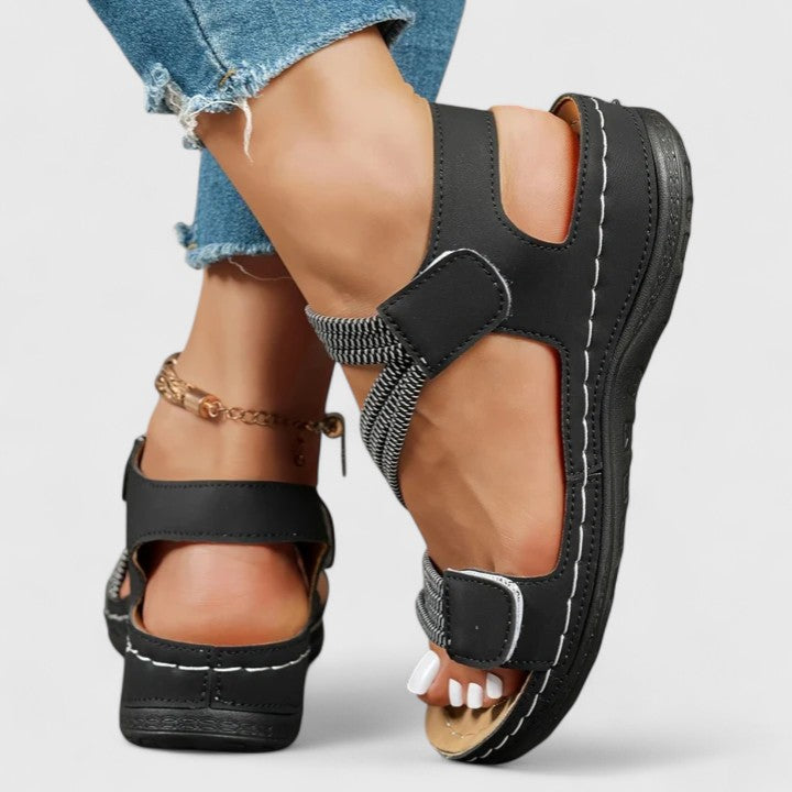 Women's therapeutic sandals offering arch comfort & foot pain relief, essential for everyday wear.