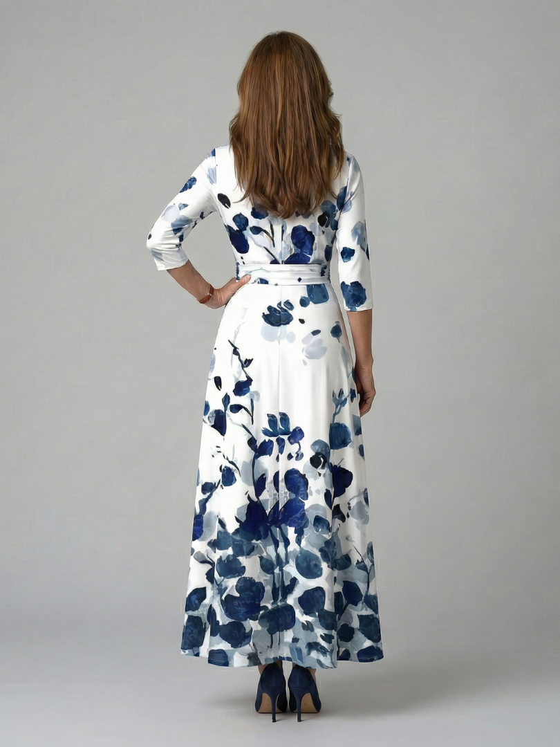 Chic women's floral cross wrap midi dress styled for a spring event, elegant & fashionable.