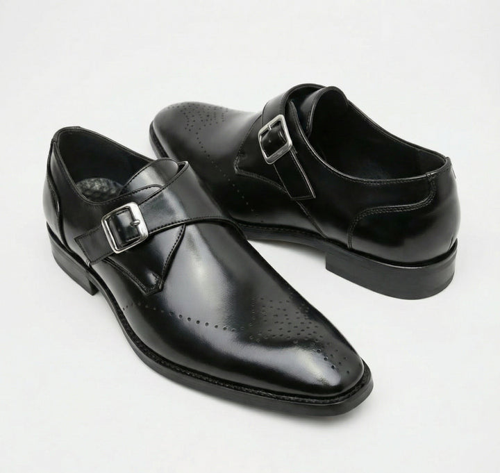 Black Italian leather loafers for men, classic fit, elegant formal slip-on dress shoes.