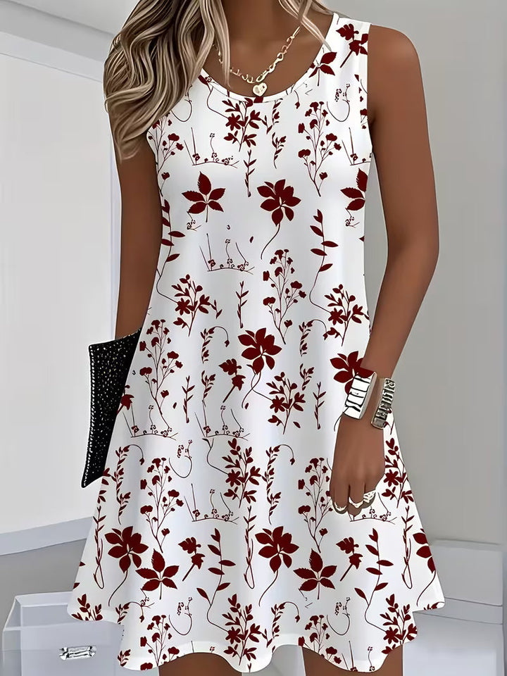 Fashionable women's elegant floral sleeveless mini dress, a stylish short summer apparel piece with a vibrant print.