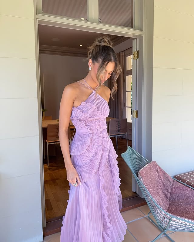 Beautiful strapless maxi dress with ruffles for women, an elegant choice for summer weddings & galas.