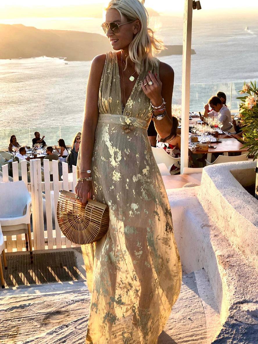 Chic women's bronze sequin V-neck long dress, an elegant sleeveless formal wear option.