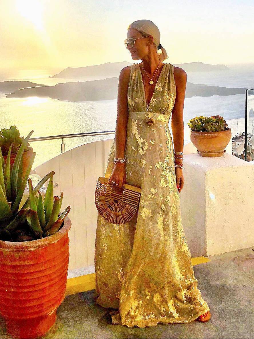 Stylish women's bronze sequin V-neck long dress, versatile for evening, party or elegant beach wear.