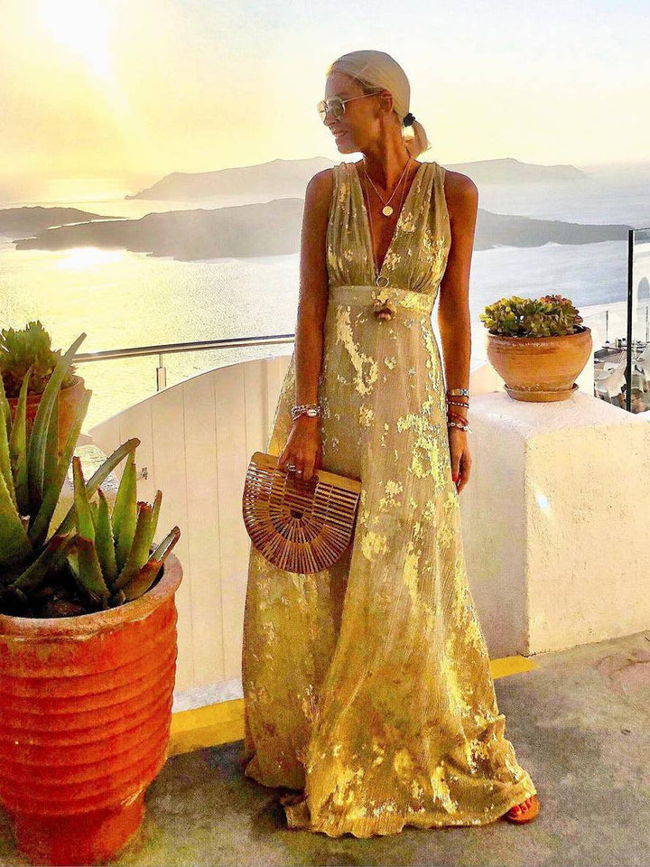 Stylish women's bronze sequin V-neck long dress, versatile for evening, party or elegant beach wear.