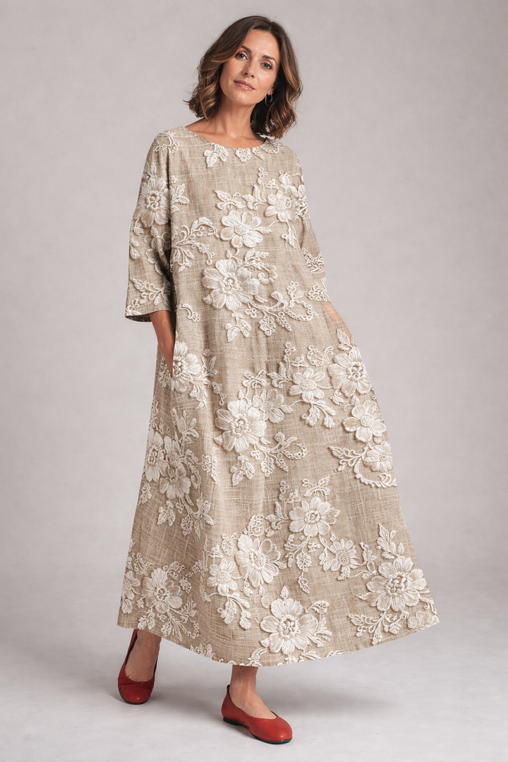 Elegant women's floral maxi dress with flowing 3/4 sleeves, ideal for spring & summer fashion.