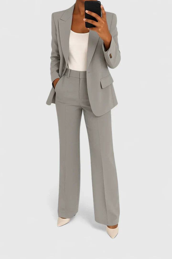 Stylish women's pantsuit with a classic tailored jacket & trousers. Ideal formal wear & business professional.