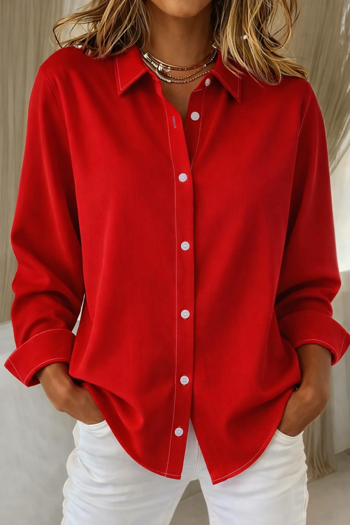 Chic women's button-down blouse featuring a stylish point collar and relaxed silhouette for modern women.