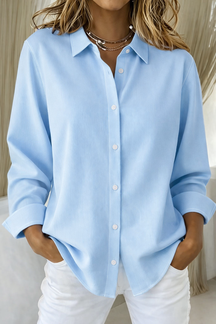 Effortless women's loose button-down blouse, a comfortable and chic long sleeve top for daily wear.