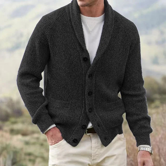 Men's classic shawl collar cardigan sweater featuring front buttons and pockets. A warm, versatile smart casual layer.