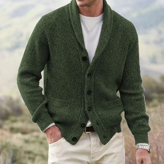Elegant men's shawl collar cardigan in a soft knit. Smart casual button-front sweater with pockets, ideal for layering.