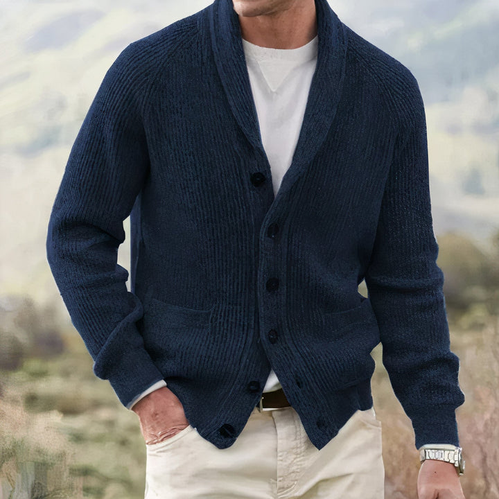 Men's navy shawl collar cardigan sweater with button front, patch pockets. Smart casual layering for everyday wear.