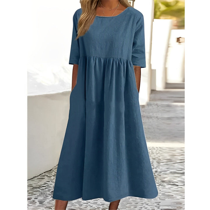 Women's comfortable midi dress, an effortless everyday essential. Perfect for casual style and versatile women's fashion.