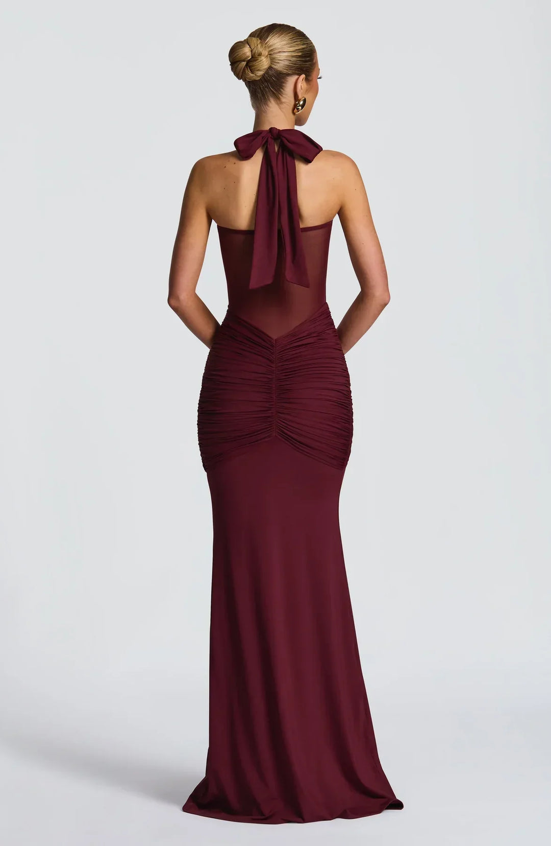 Women's luxurious party maxi dress, an elegant hourglass silhouette ideal for celebrations.