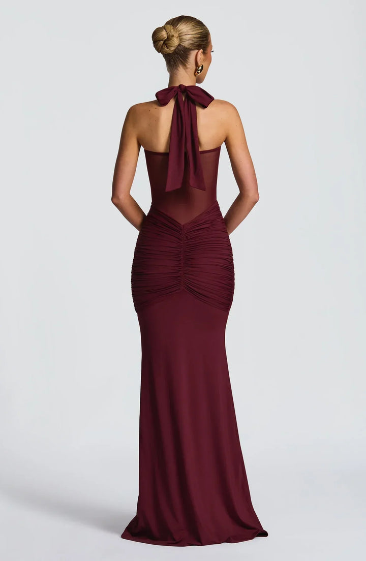 Women's luxurious party maxi dress, an elegant hourglass silhouette ideal for celebrations.