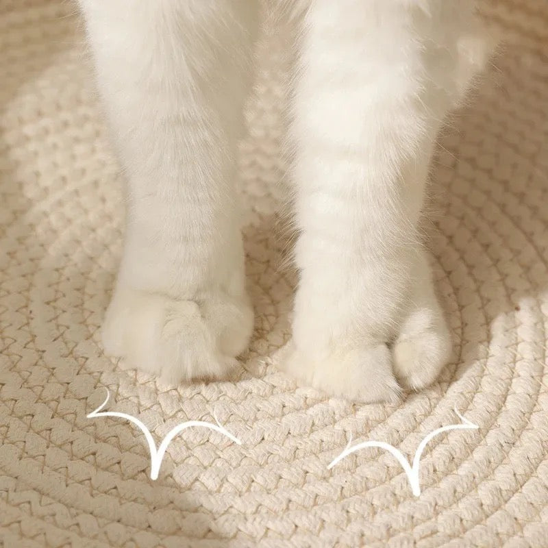 Modern gray cotton rope cat lounge bed, hand-woven, offering a cozy spot & a durable scratching surface.