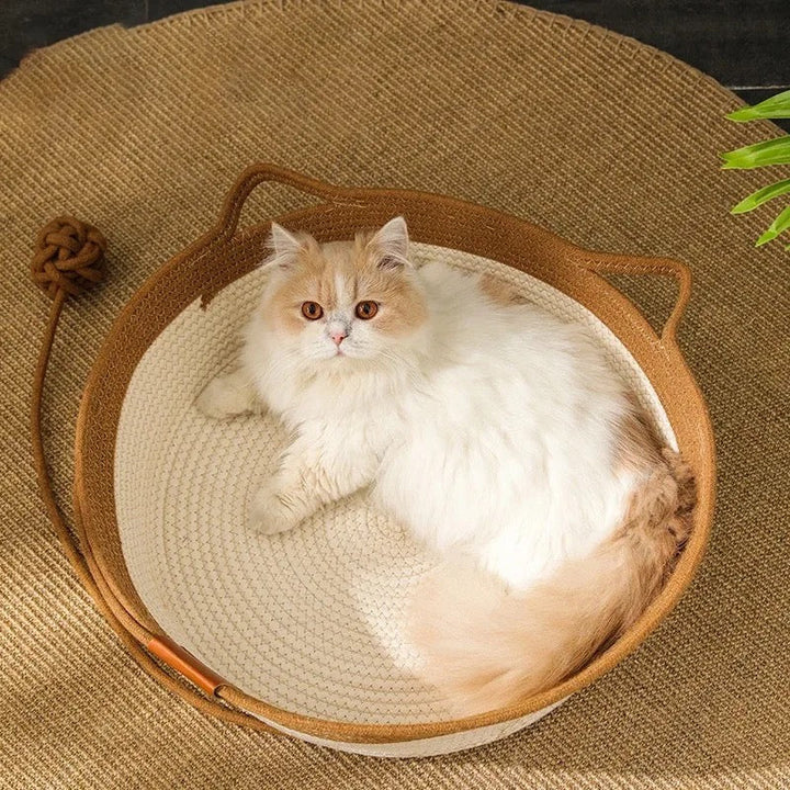 Soft cotton rope hand-woven cat bed doubles as a scratching post for feline play and lounge comfort.