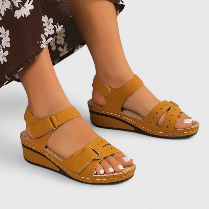 Close-up of women's orthopaedic sandals, showing adjustable straps & cushioned footbed for ultimate comfort.