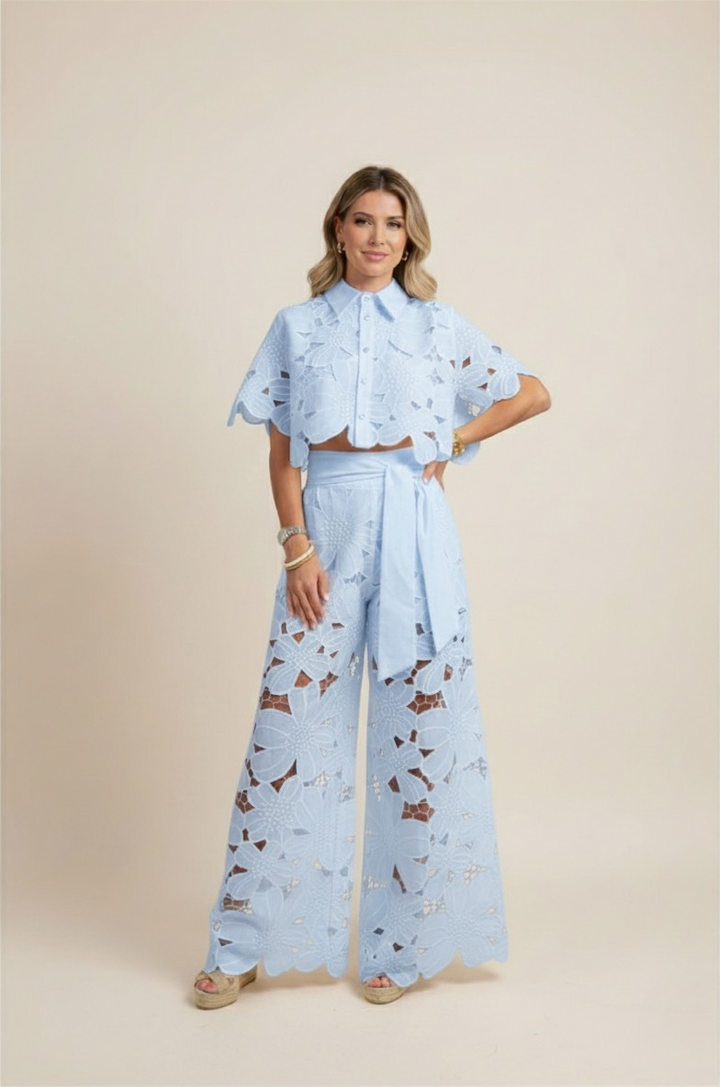 Stylish women's two-piece ensemble: embroidered top and wide-leg trousers for summer.