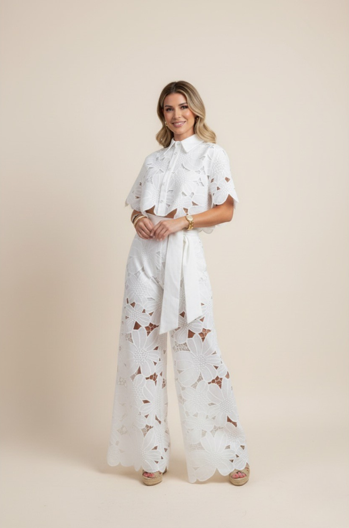 Elegant floral embroidered women's two-piece matching set, perfect for resort wear.