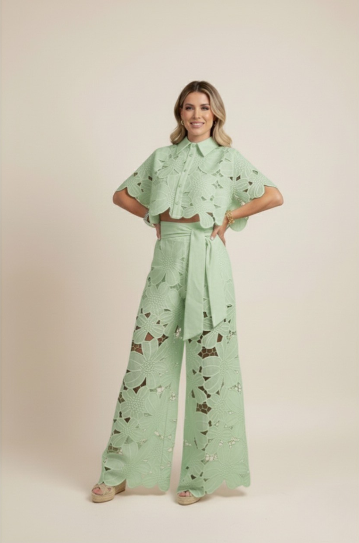 Women's elegant two-piece summer outfit with intricate floral embroidery & wide-leg design.