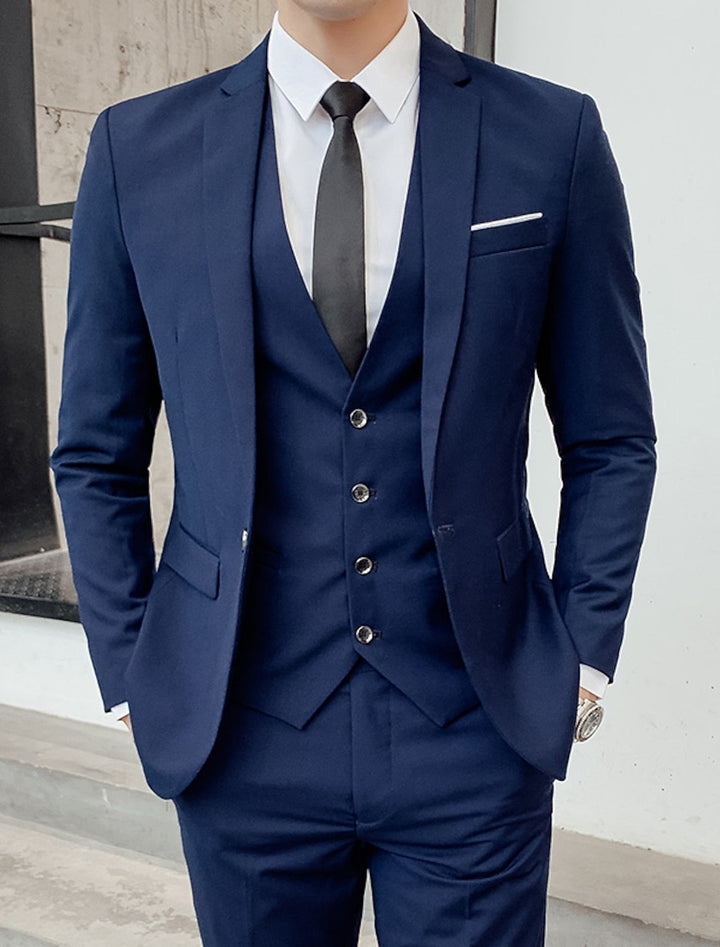 High-quality men's tailored 3-piece suit, single-breasted, two-button, designed for formal occasions.