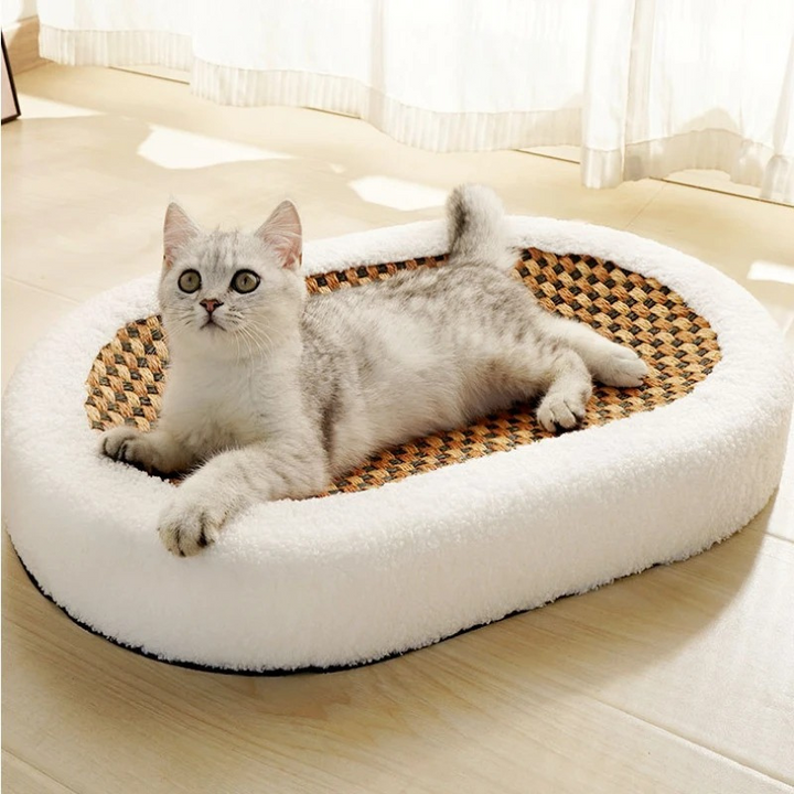 Modern 2-in-1 cat bed & scratcher with durable sisal surface & soft oxford fabric lounge for feline comfort.