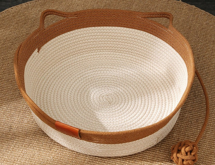 Stylish cat accessory: Hand-woven cotton rope bed & scratcher providing a cozy, comfortable lounge for cats.