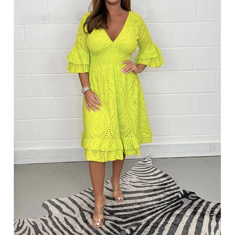 Chic women's embroidered midi dress, exuding timeless elegance and perfect for any graceful event.