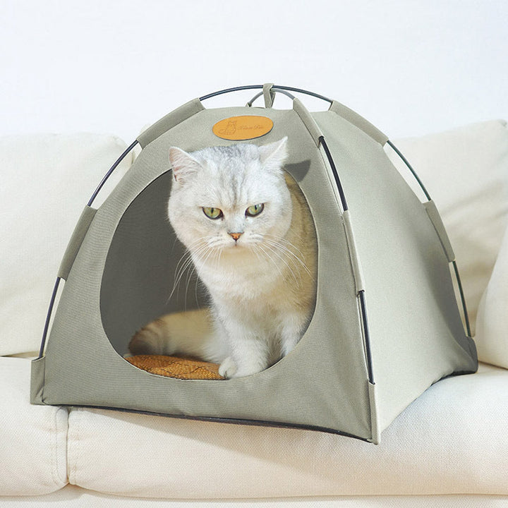 View of the spacious interior of the premium cat cooling tent, showing the cozy rattan mat for pet comfort.