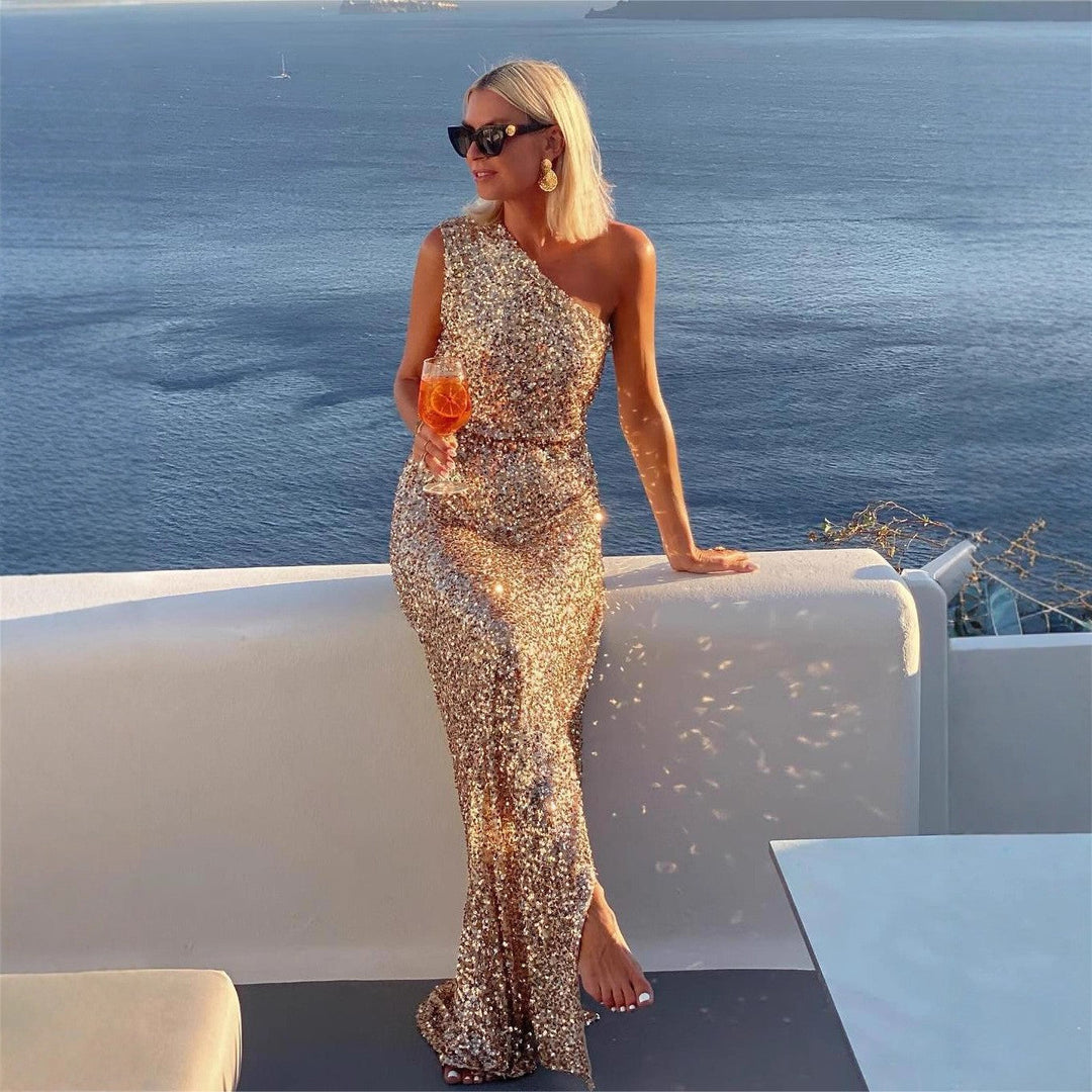 Glamorous sequin evening gown for women, featuring a flattering side slit. Ideal for cocktail parties.