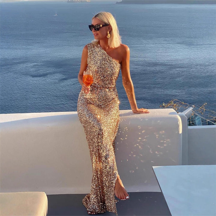 Glamorous sequin evening gown for women, featuring a flattering side slit. Ideal for cocktail parties.