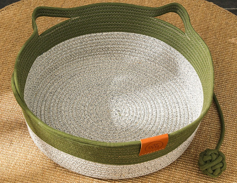 Khaki hand-woven cotton rope cat bed offers a comfortable lounge and sturdy scratching surface for feline fun.