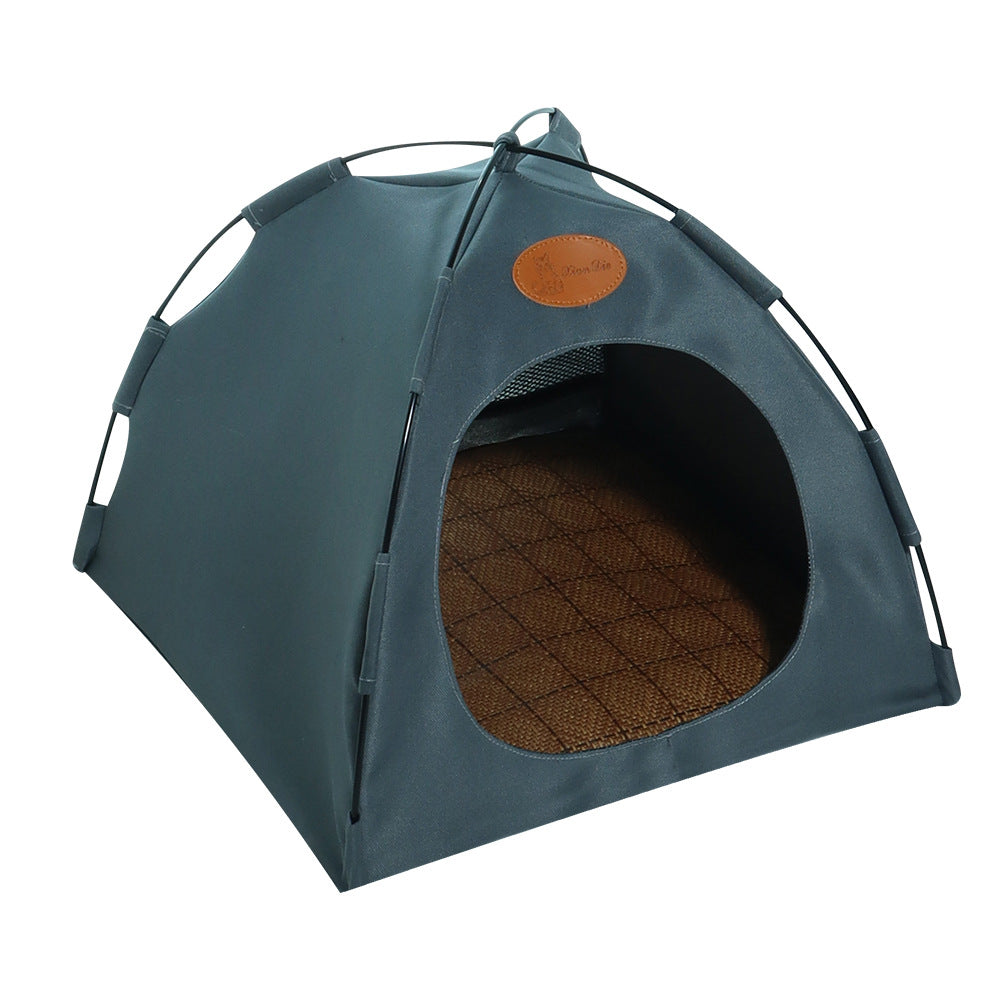 A happy cat resting inside the premium cooling tent bed with its comfortable rattan mat. Ideal pet retreat.