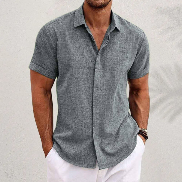 Relaxed fit men's collared button shirt, classic design for effortless style and everyday wear.