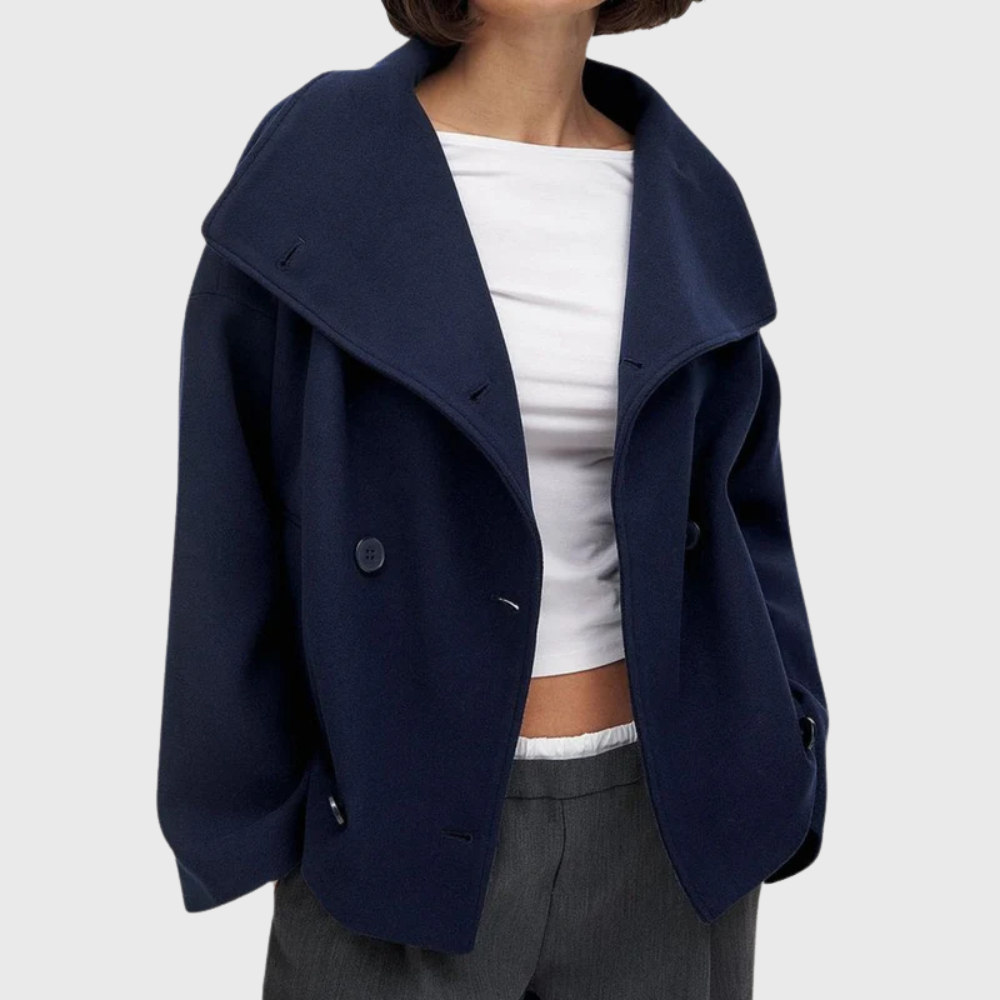 Modern women's cropped jacket, double-breasted front, wide lapel. Perfect for chic fashion.